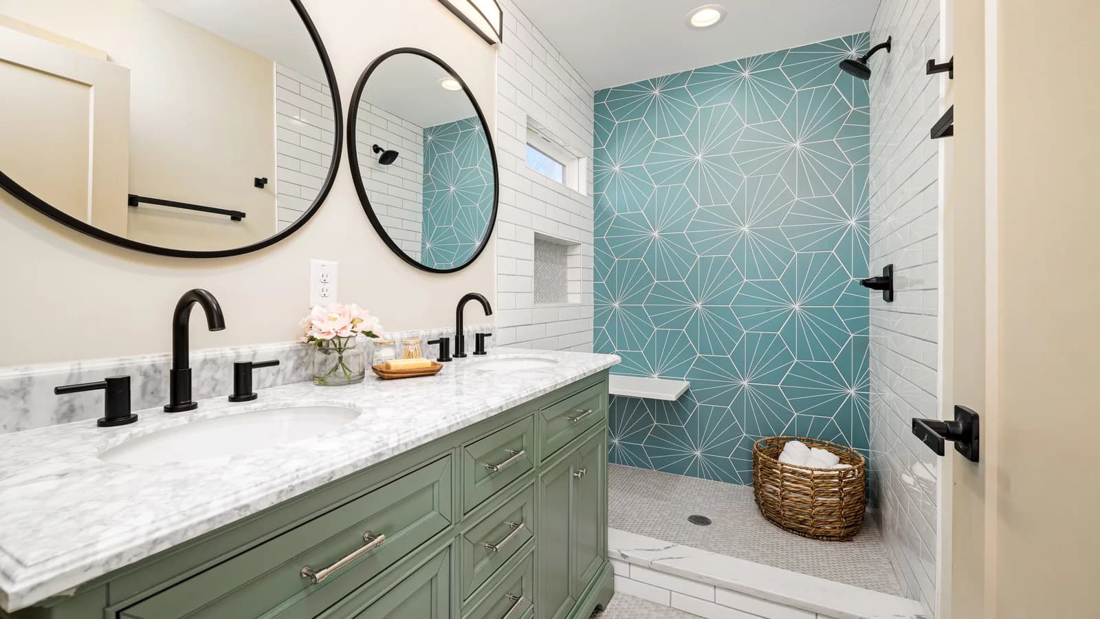 Bathroom with geometric blue feature tile, subway tile, and mosaic floors