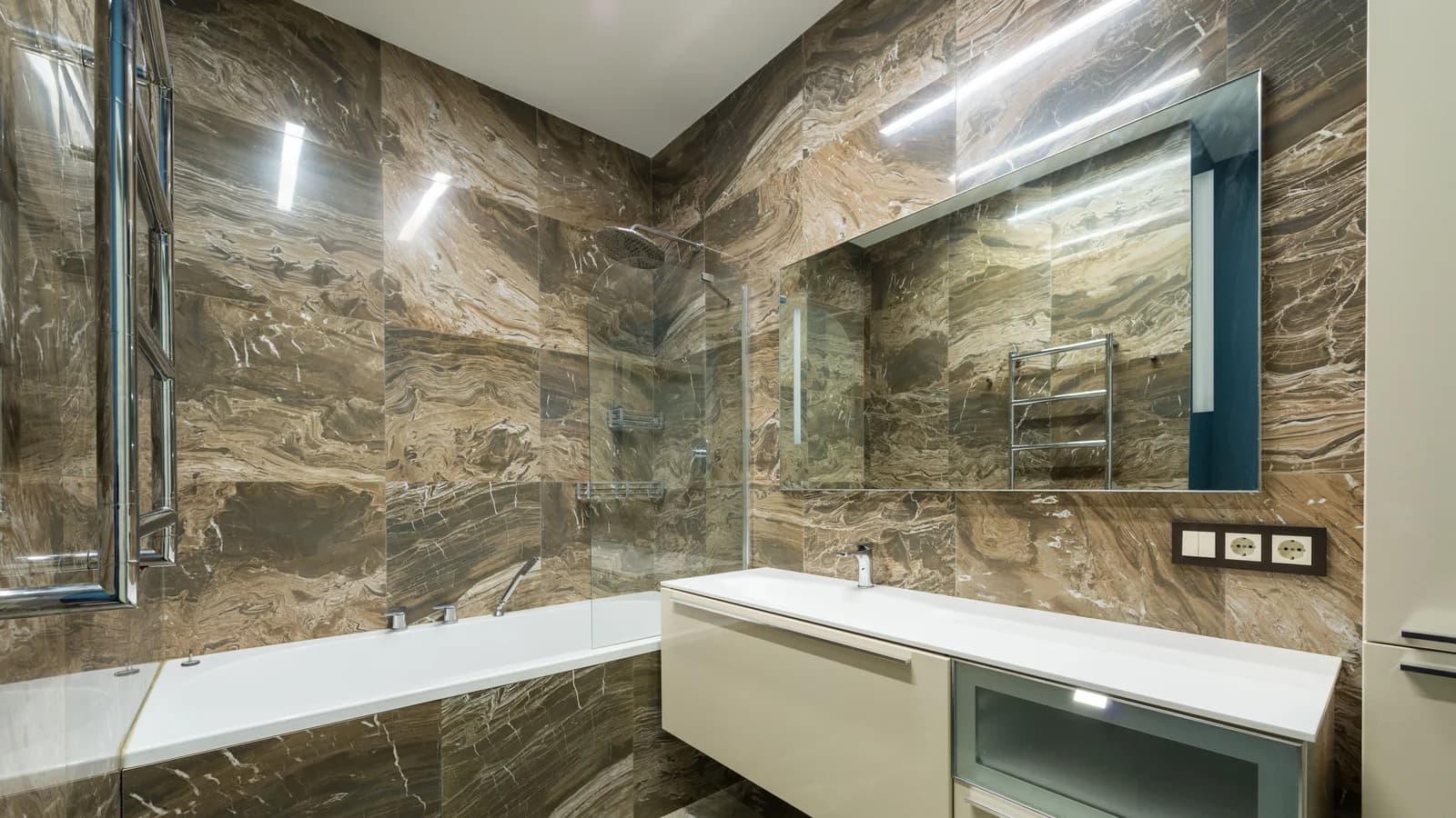Bathroom finished with large stone wall panels