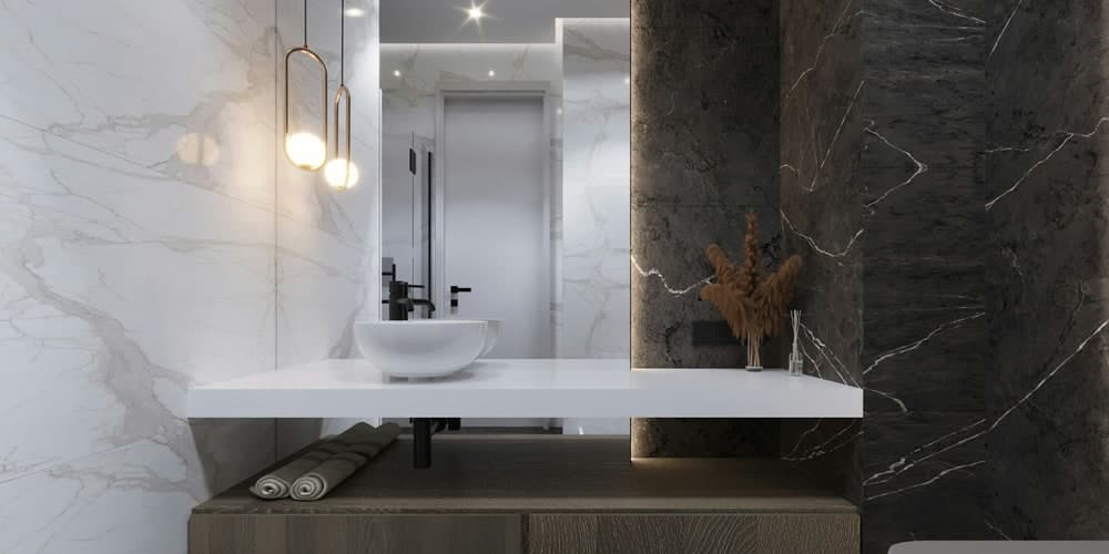 Large-format custom bathroom tile installed around a vanity